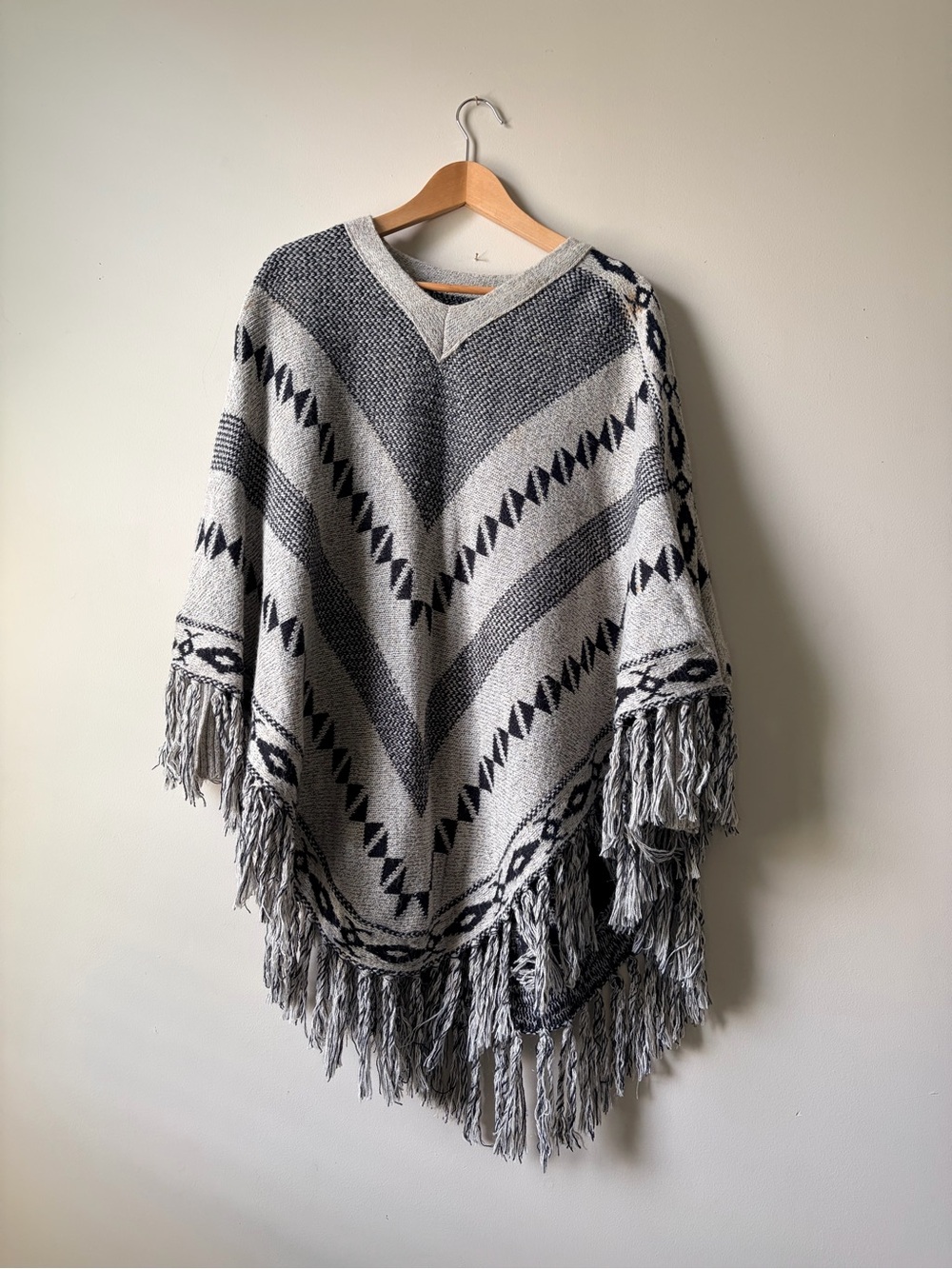 Fringed V-Neck Poncho Sweater in Gray and Black